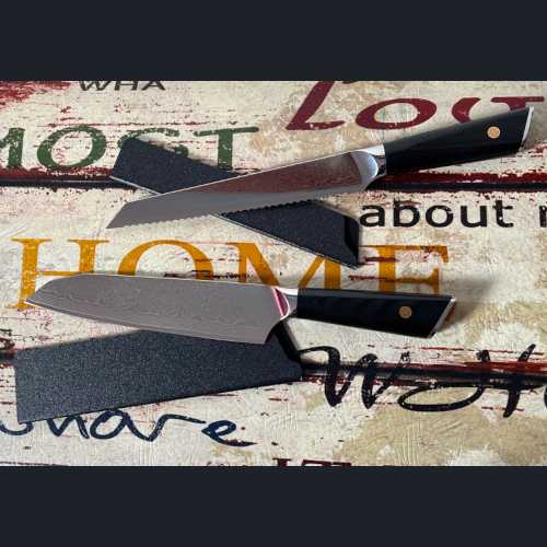 Produktbewertung von Tobias P. vom Santoku- und Brotmesser der V2 - Black Serie mit G10 Griff in chwarz