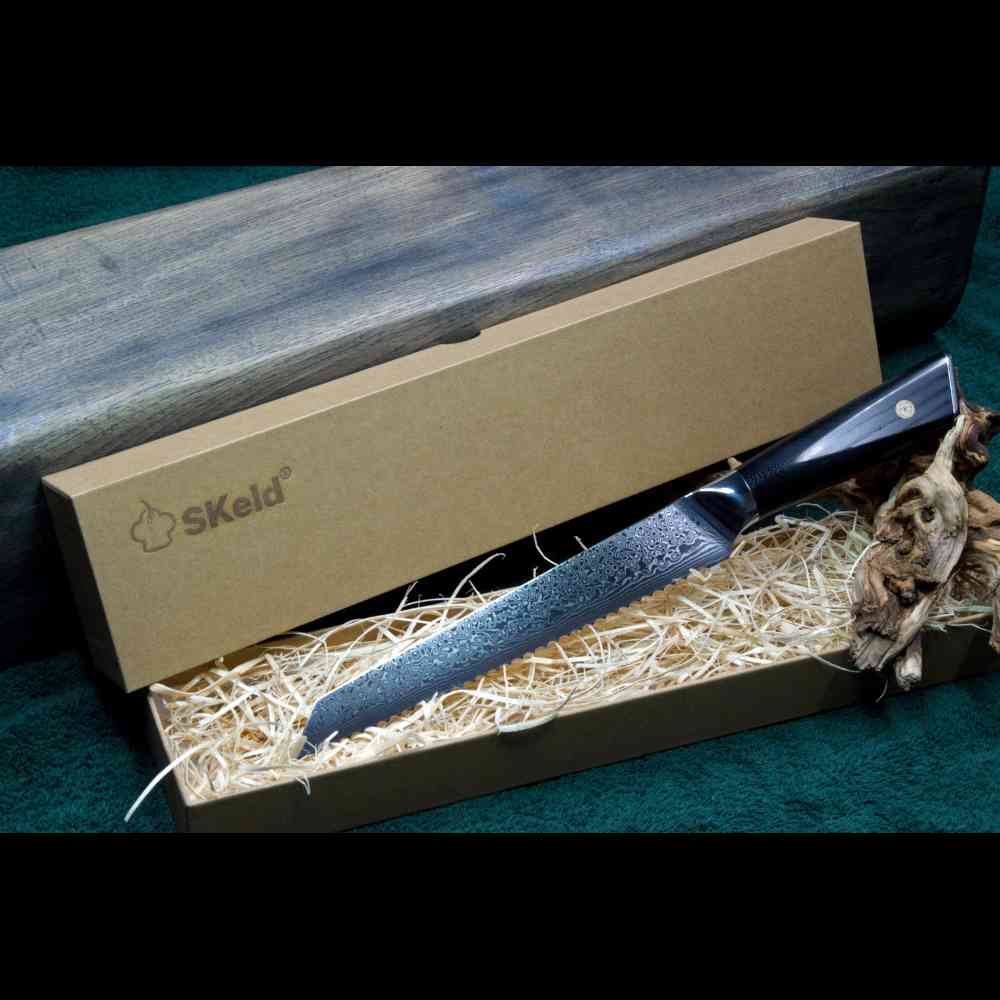 SKeld® - Schneidemesser Geschenkbox mit Holzwolle-Polsterung und Damast Brotmesser mit schwarzem G10-Griff