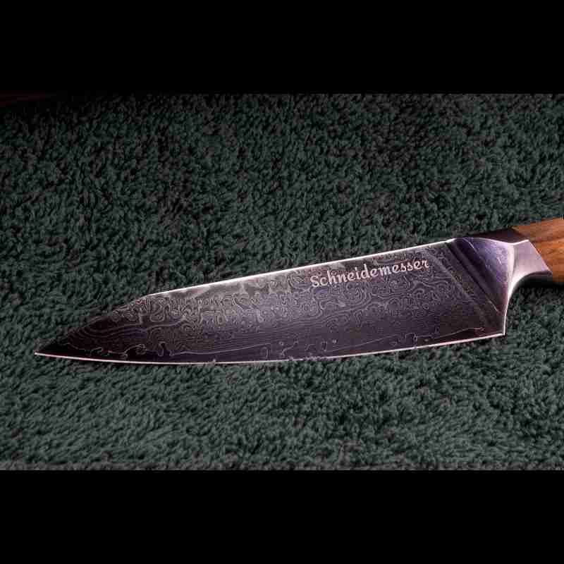 Nahaufnahme der SKeld™ - Schneidemesser, 13 cm Klinge mit sichtbarer Damaststruktur